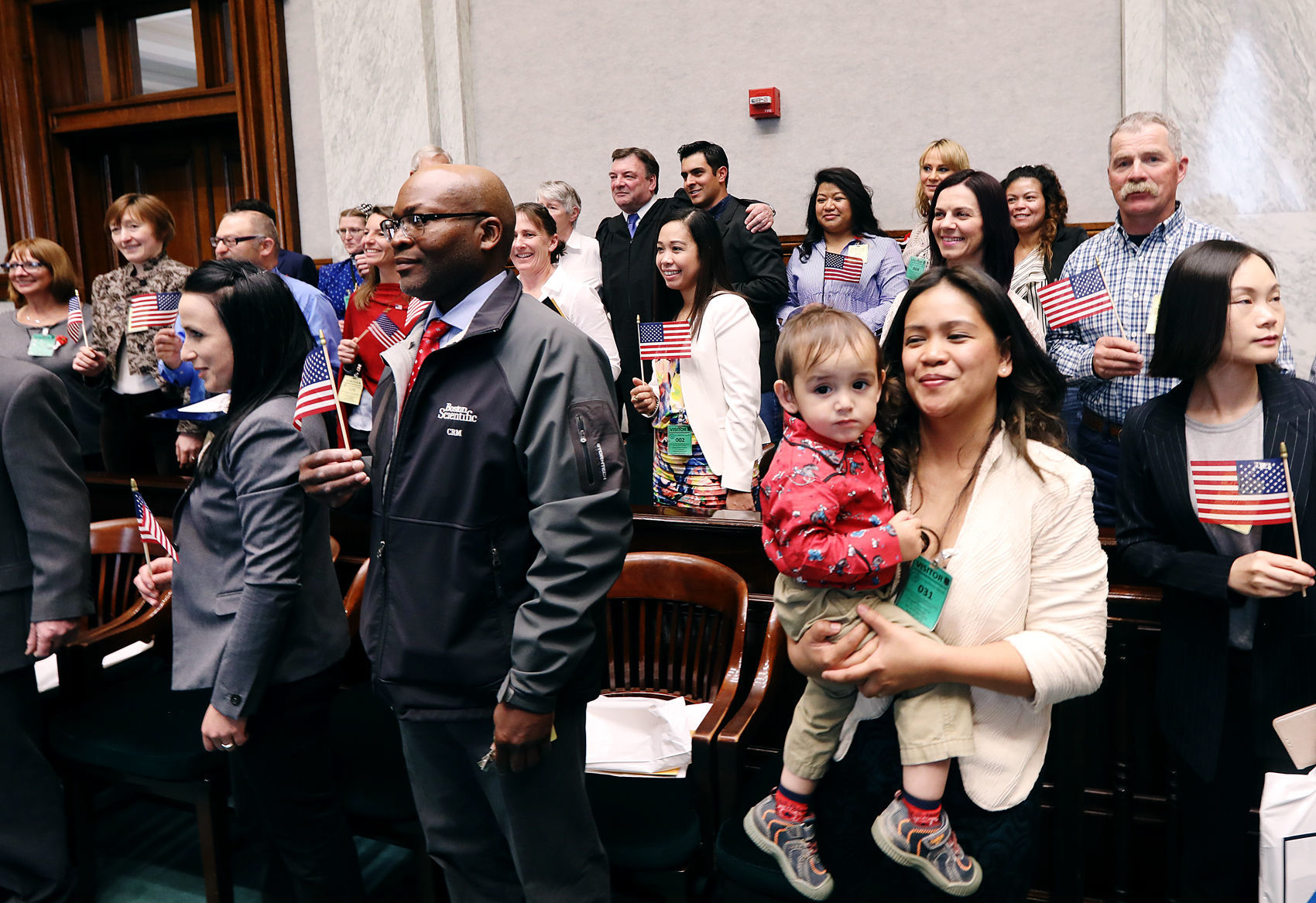 'It feels awesome'; 25 new American Citizens participate in Naturalization Ceremony
